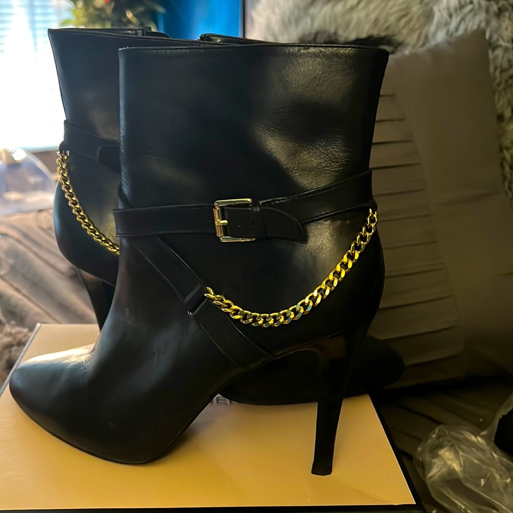 Ralph Lauren ankle boots in black with gold chain.